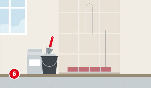 Illustration mit dem Titel „Schritt 6“ einer Hagebau-Anleitung zum Selbstbau eines Kaminofens. Vor einer markierten, verfliesten Wand ist ein kleiner Sockel aus roten Schamottsteinen begonnen worden. Daneben stehen ein Eimer mit Mörtelkelle und ein Sack mit Mörtel